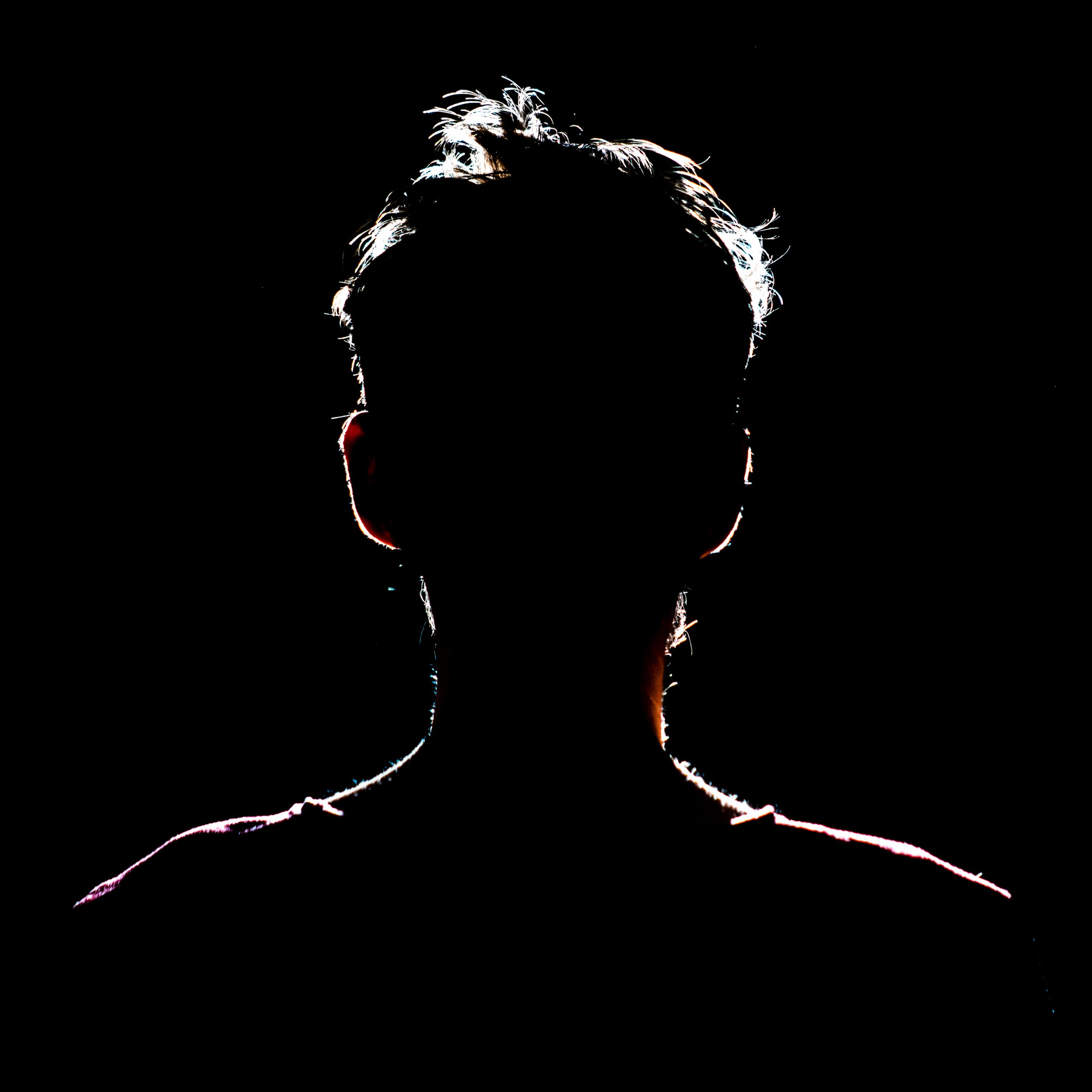 Silhouette photograph of someone's head