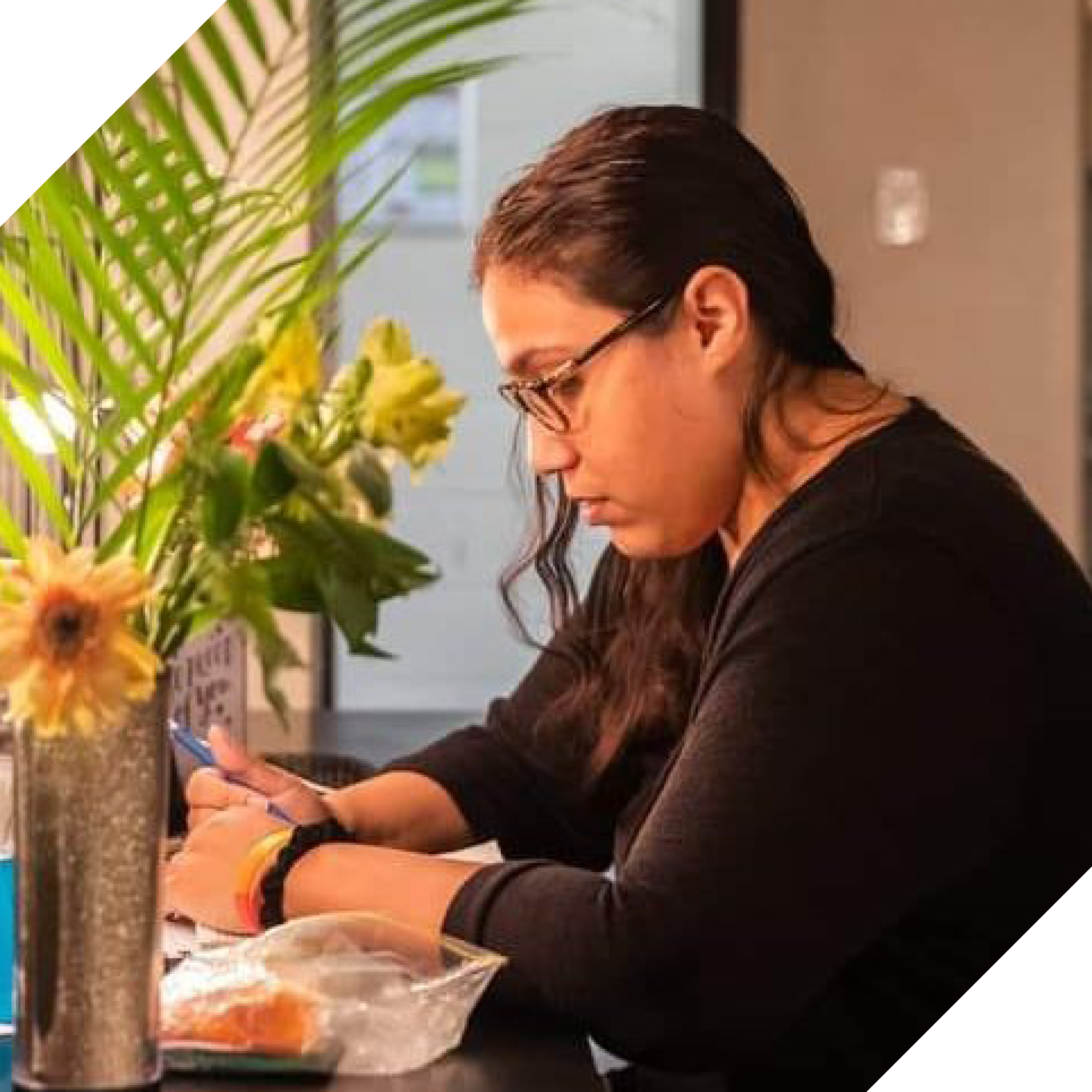 Photograph of Rachael sitting down backstage