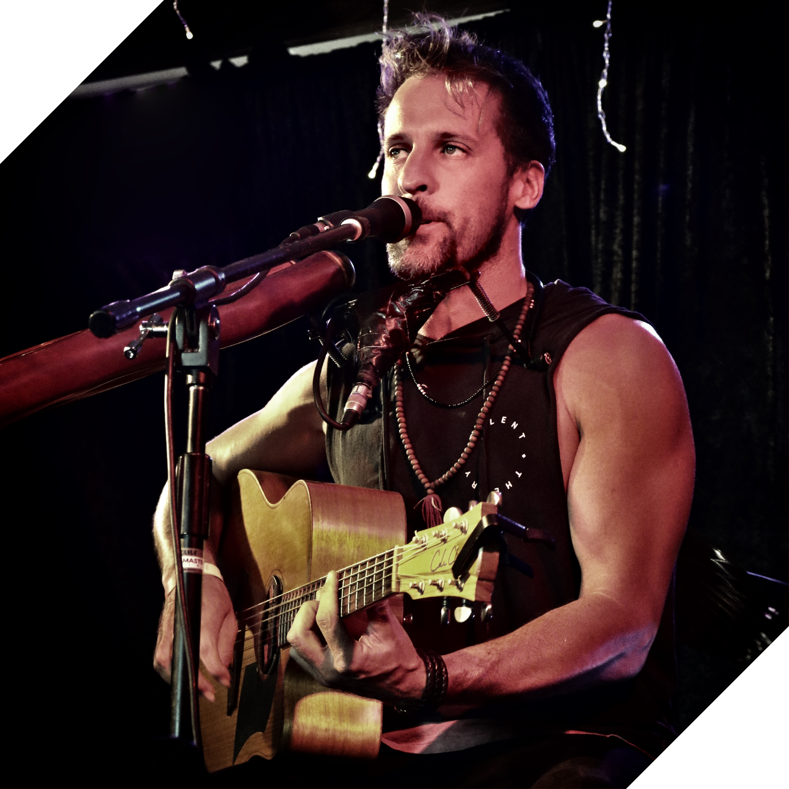 Photograph of musician Adam Scriven