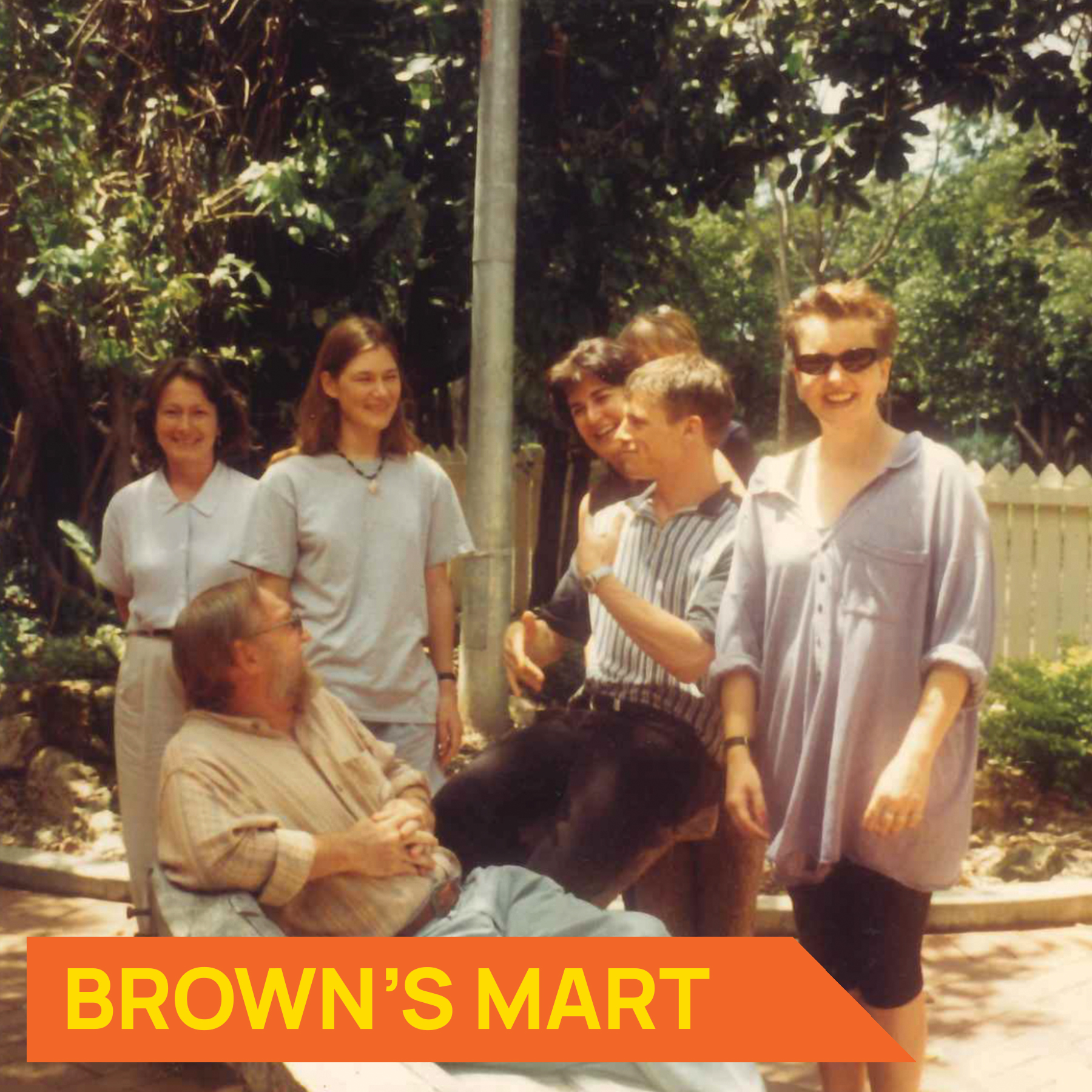 Photograph of group of people standing in Brown's Mart courtyard